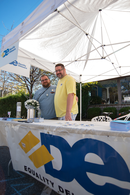 John Lucas, left, and Mark Purpura, co-presidents for Equality Delaware, share information. BY DENY HOWETH